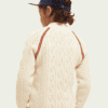 Boy Wearing a Hat in a White Sweater Back View