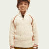 Boy Wearing a Hat in a White Sweater Front View